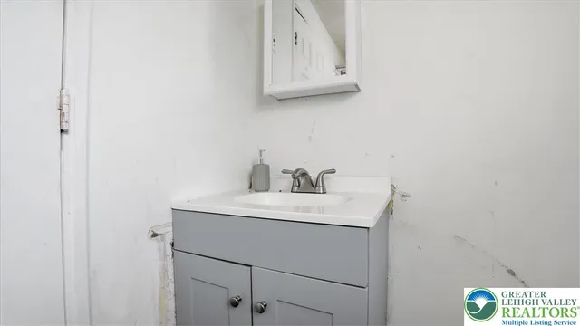 a bathroom with a shower and a toilet
