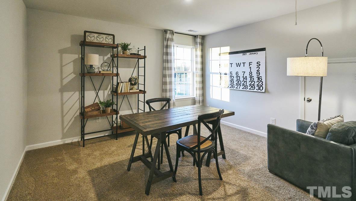 4032 Water Wheel Road Rocky Mount, NC 27803 - Photo 23 of 29 a view of a livingroom with furniture and window