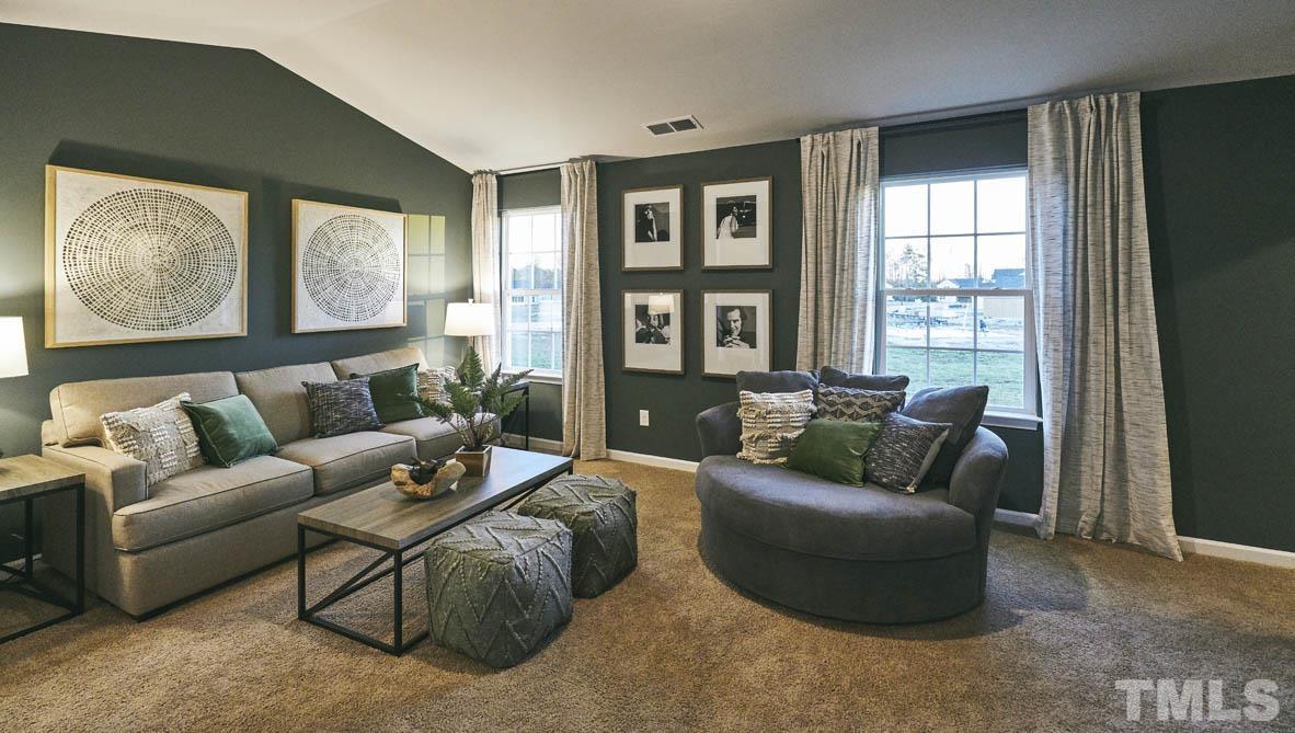 4032 Water Wheel Road Rocky Mount, NC 27803 - Photo 26 of 29 a living room with furniture and a large window