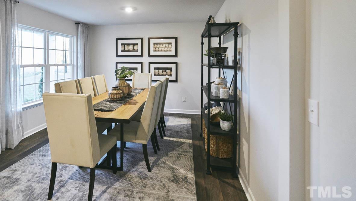 4032 Water Wheel Road Rocky Mount, NC 27803 - Photo 3 of 29 a view of a dining room with furniture