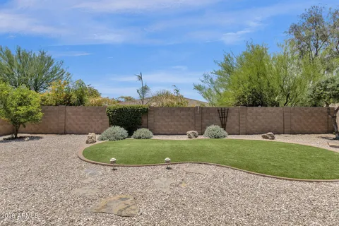 a view of a backyard with green space