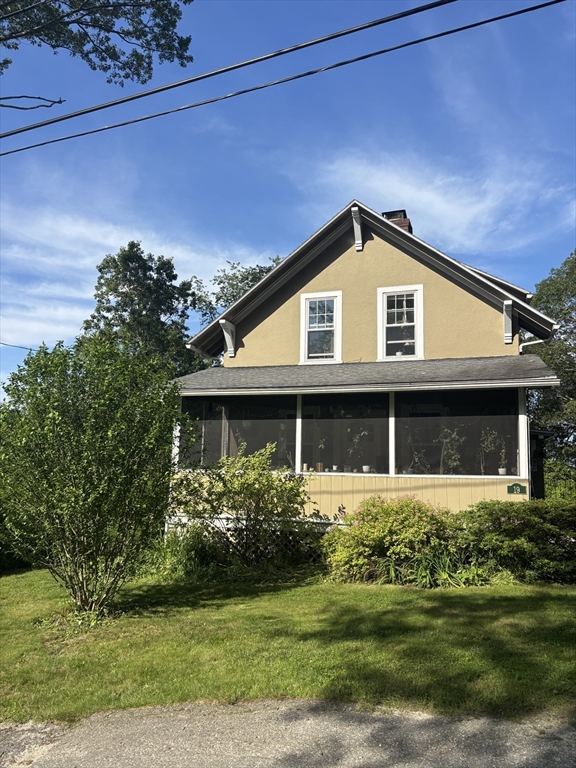 19 Aldena Road Worcester, MA 01603 - Photo 1 of 15 a front view of a house with a garden