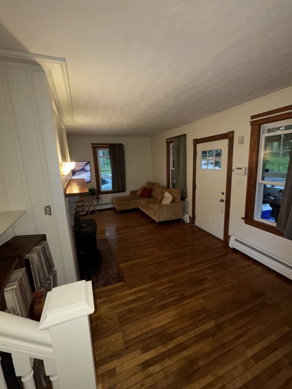 19 Aldena Road Worcester, MA 01603 - Photo 11 of 15 a living room with furniture and a flat screen tv