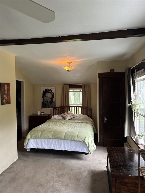 19 Aldena Road Worcester, MA 01603 - Photo 14 of 15 a bedroom with a bed and a flat screen tv