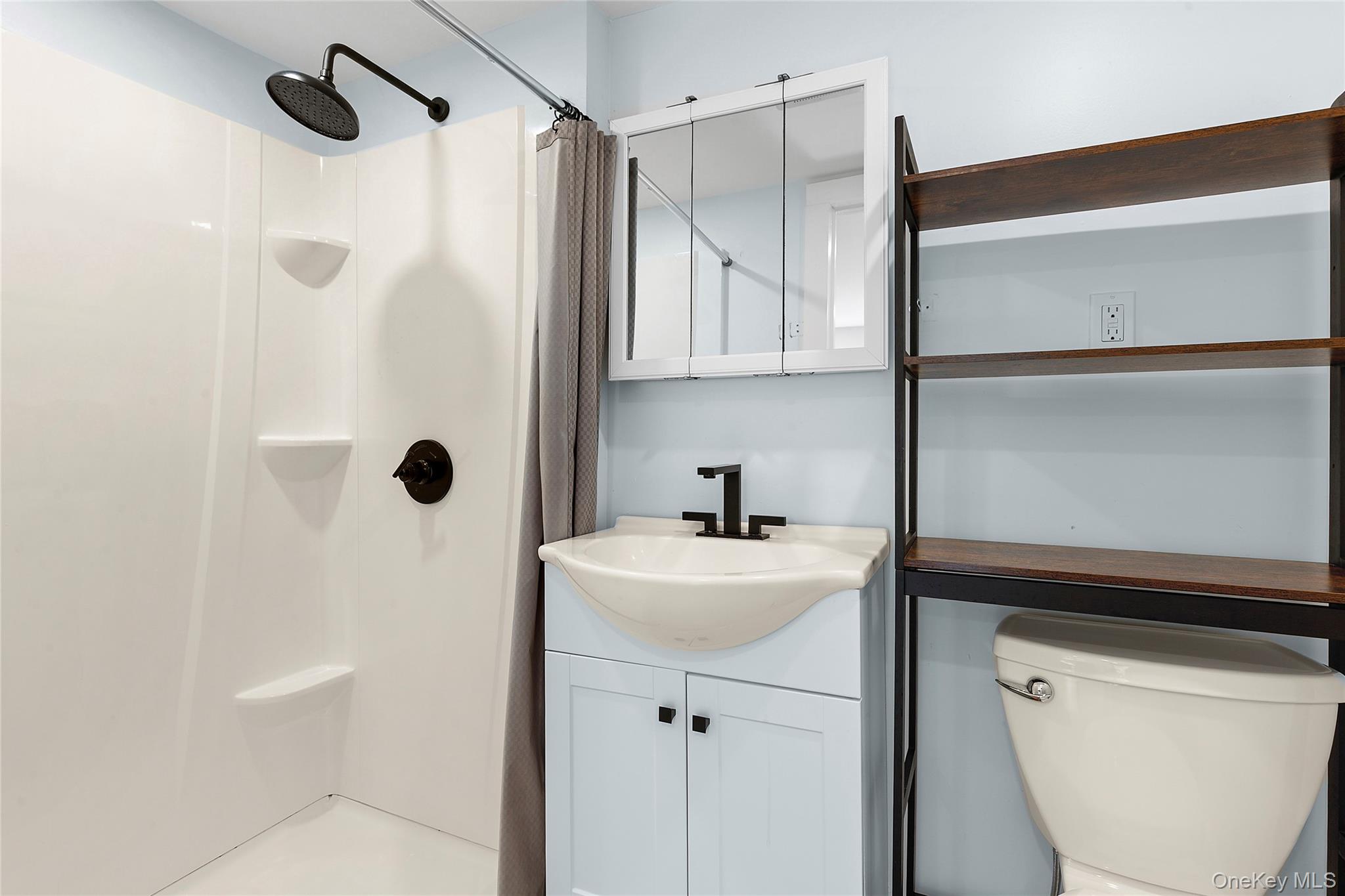 73175 Main Road Greenport, NY 11944 - Photo 14 of 15 Full bath with vanity and a shower stall