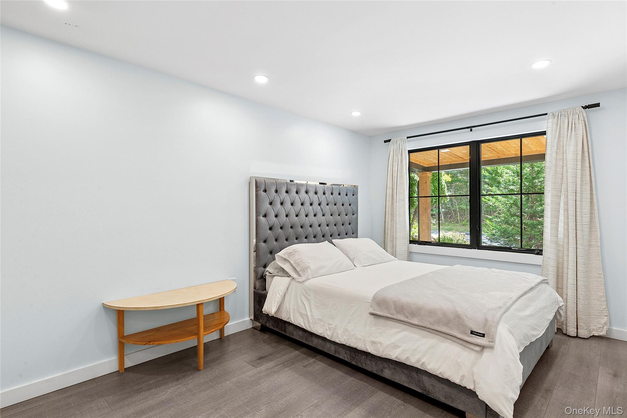 73175 Main Road Greenport, NY 11944 - Photo 8 of 15 1st Floor bedroom with recessed lighting and wood finished floors