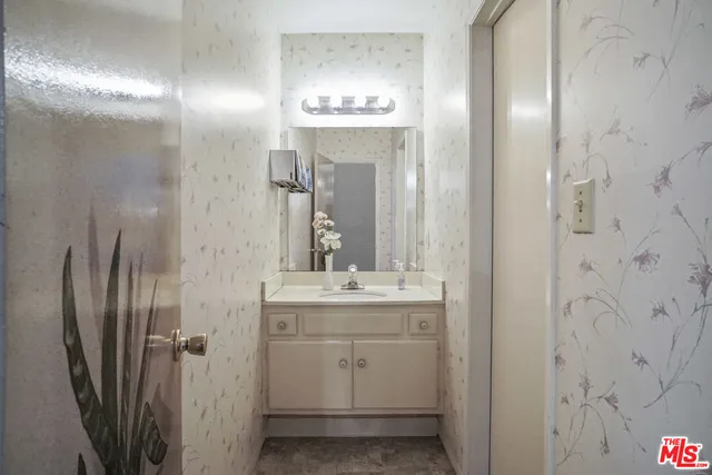 a view of swimming pool with outdoor seating