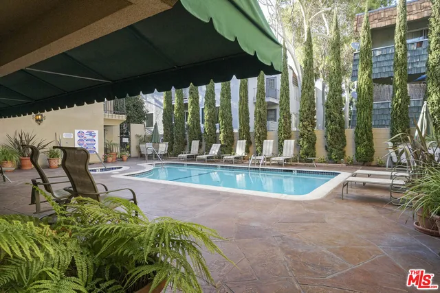 a view of a house with swimming pool