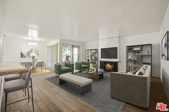 a view of a balcony with two chairs and a table