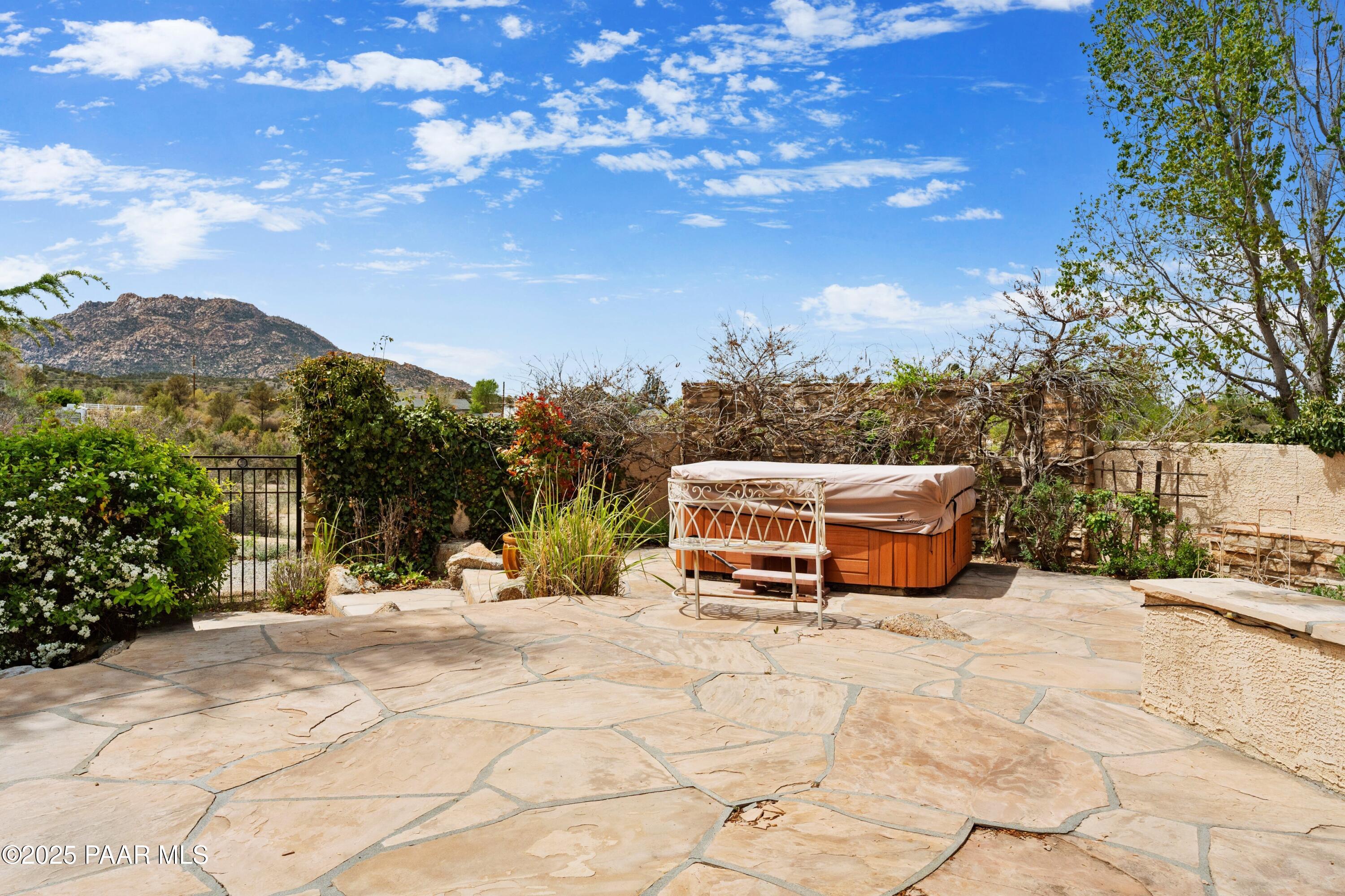 1530 West Ridge Drive Prescott, AZ 86305 - Photo 49 of 71 049_Lower Patio Hot Tub & Fireplace