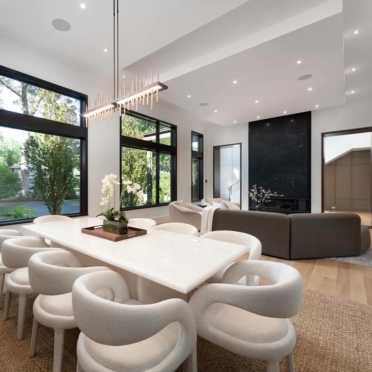 23 Thoreau Road, Unit 23 Lexington, MA 02420 - Photo 13 of 30 a living room with furniture and a large window
