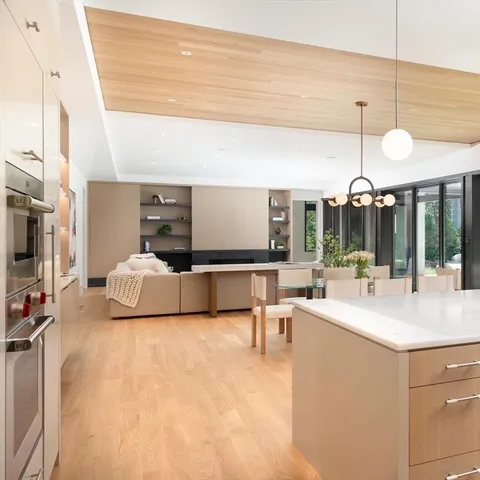 a view of living room with furniture and window