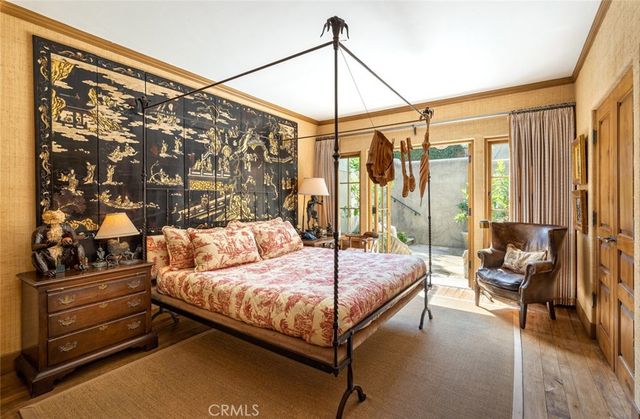 a bathroom with a granite countertop sink a mirror and vanity