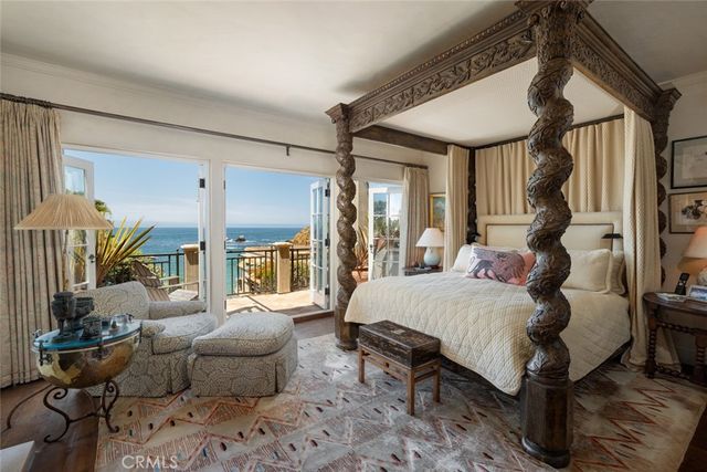 a view of a roof deck with wooden fence and floor