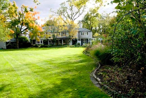 969 Hill Road Winnetka, IL 60093 - Photo 2 of 25 a view of house with a garden