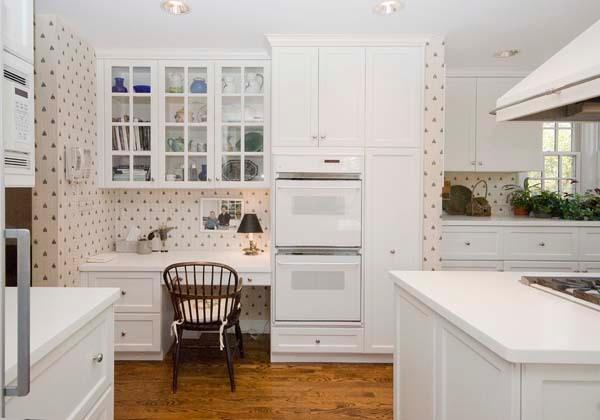 969 Hill Road Winnetka, IL 60093 - Photo 13 of 25 a kitchen with a sink a stove and white cabinets