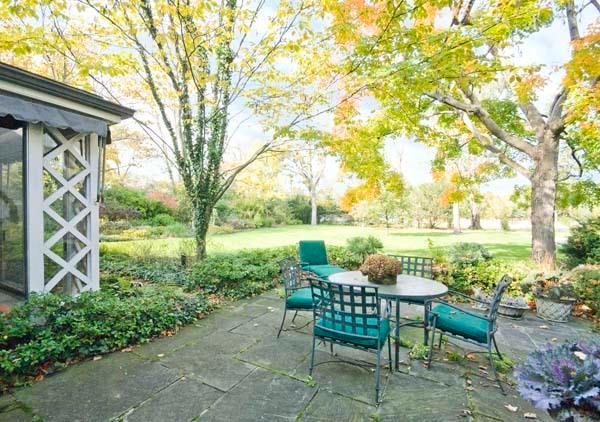 969 Hill Road Winnetka, IL 60093 - Photo 22 of 25 a view of a chairs and table in the garden