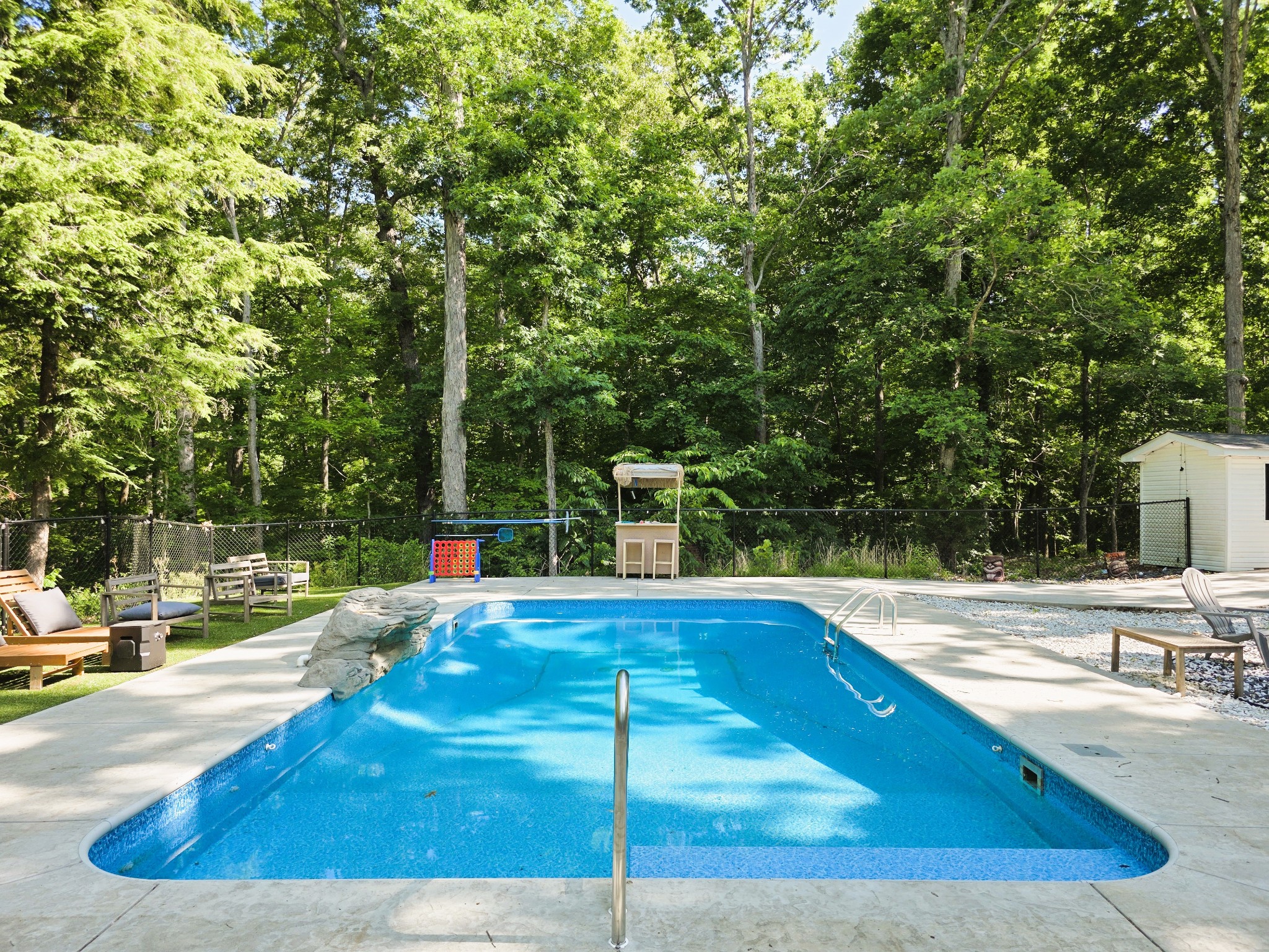 1975 Kelly Road Holladay, TN 38341 - Photo 9 of 95 a view of a swimming pool with an outdoor space