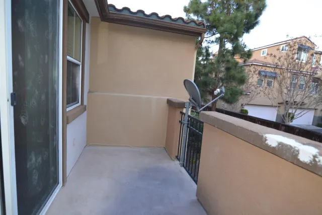 a view of a house with a street