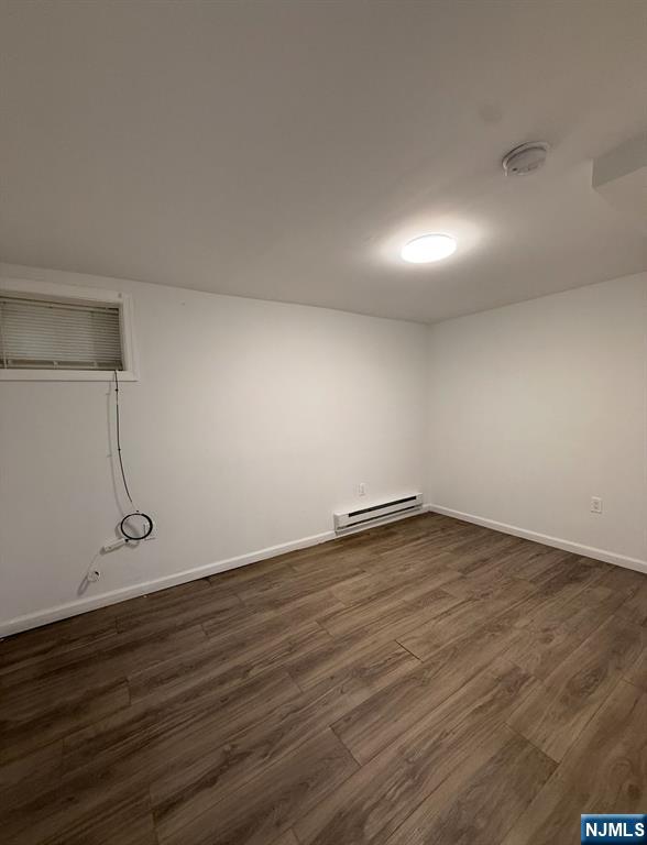 100 Rosa Parks Boulevard, Unit B1B Paterson, NJ 07501 - Photo 5 of 10 a view of an empty room with wooden floor