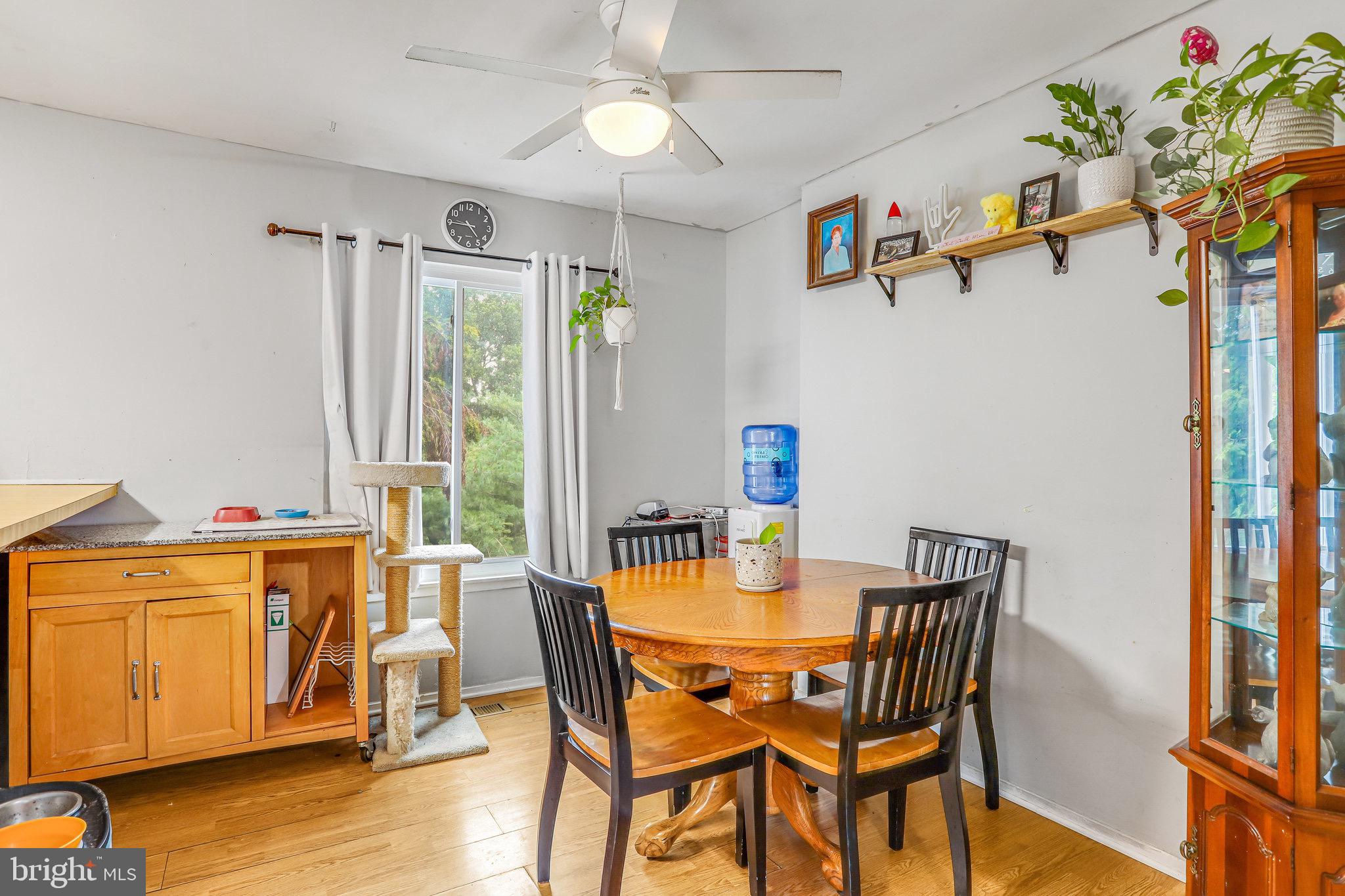 24 Mountaingate Drive Frederick, MD 21703 - Photo 9 of 32 a view of a dining room with furniture window and wooden floor