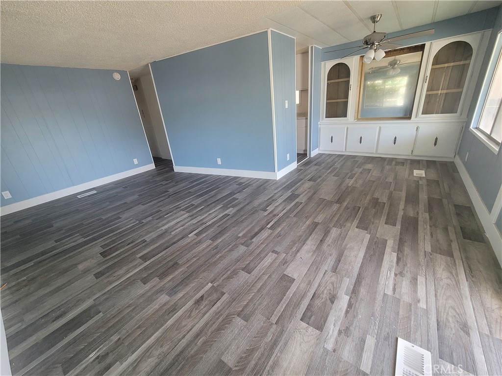 18151 Valley Boulevard, Unit 55 La Puente, CA 91744 - Photo 15 of 38 a view of entryway with wooden floor