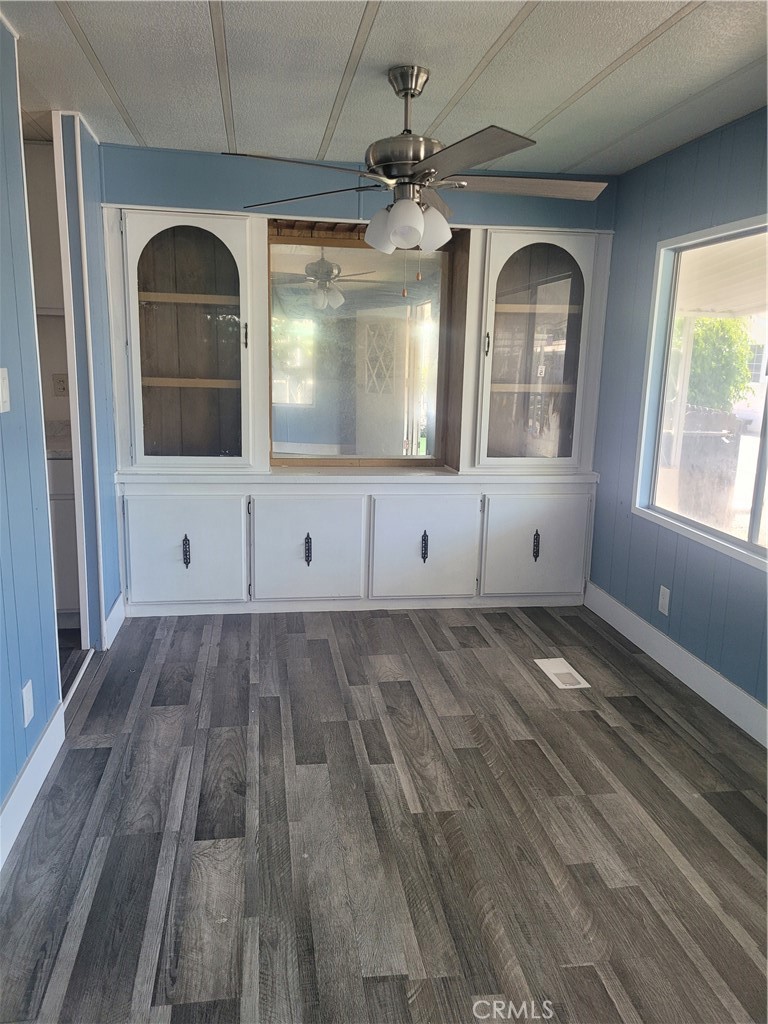 18151 Valley Boulevard, Unit 55 La Puente, CA 91744 - Photo 16 of 38 a view of empty room with wooden floor and fan