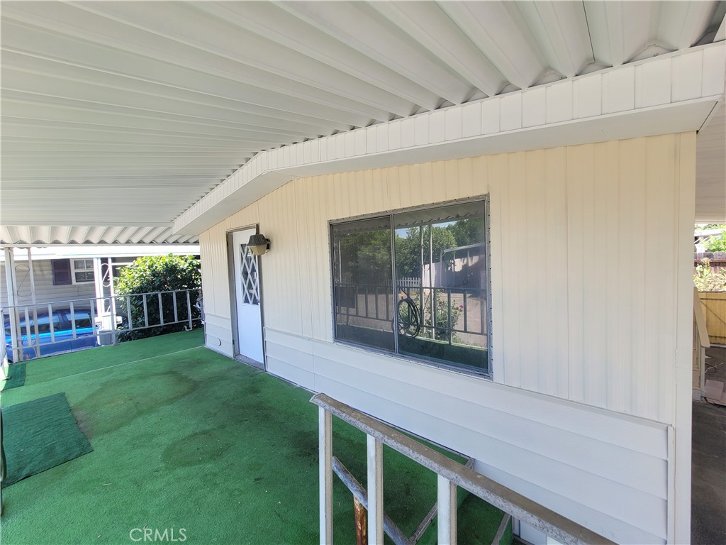 18151 Valley Boulevard, Unit 55 La Puente, CA 91744 - Photo 3 of 38 a view of a porch with a backyard