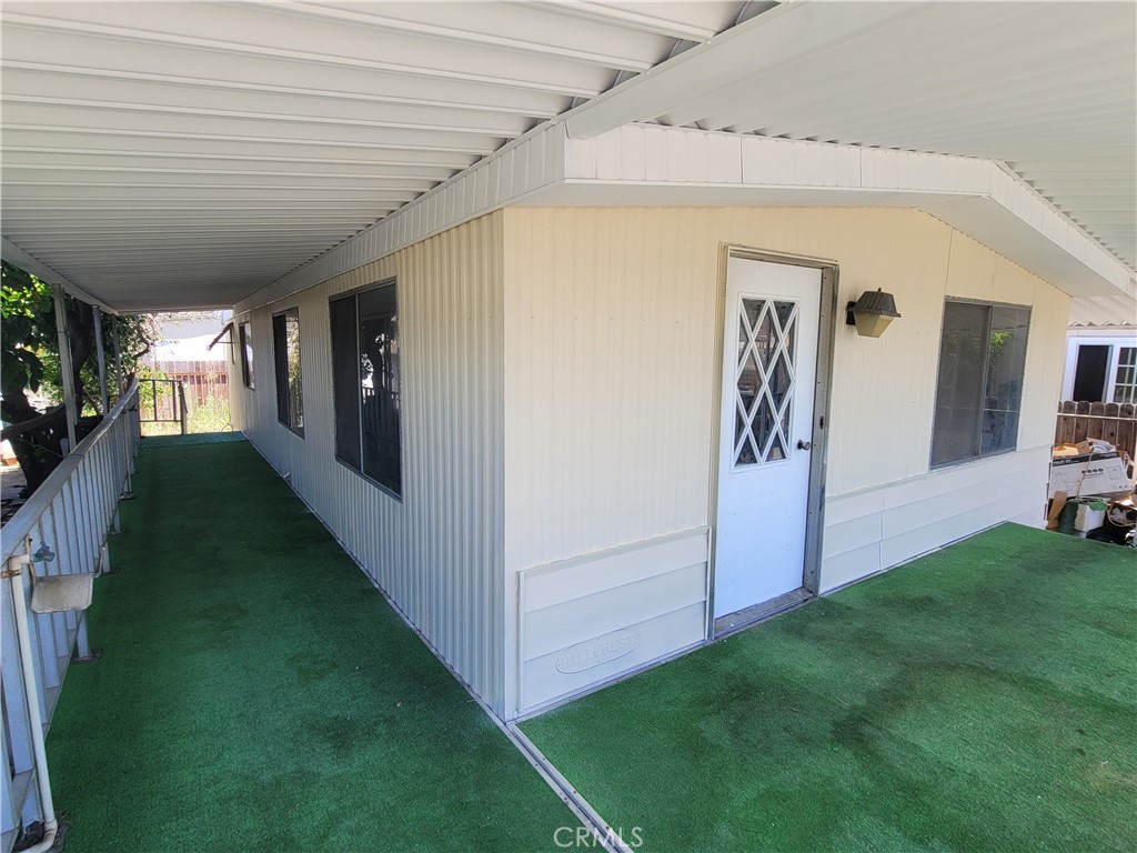 18151 Valley Boulevard, Unit 55 La Puente, CA 91744 - Photo 4 of 38 a view of a porch