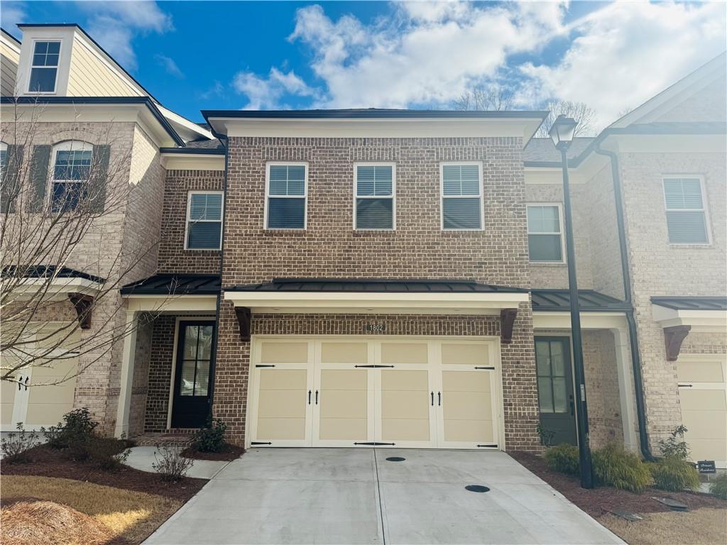 1802 Wellborn Walk Suwanee, GA 30024 - Photo 1 of 1 front view of a house
