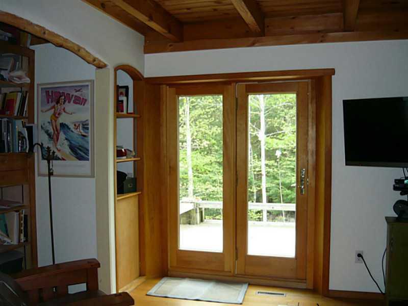 839 River Road Woolwich, ME 04579 - Photo 8 of 18 Den. Looking out to the private deck
