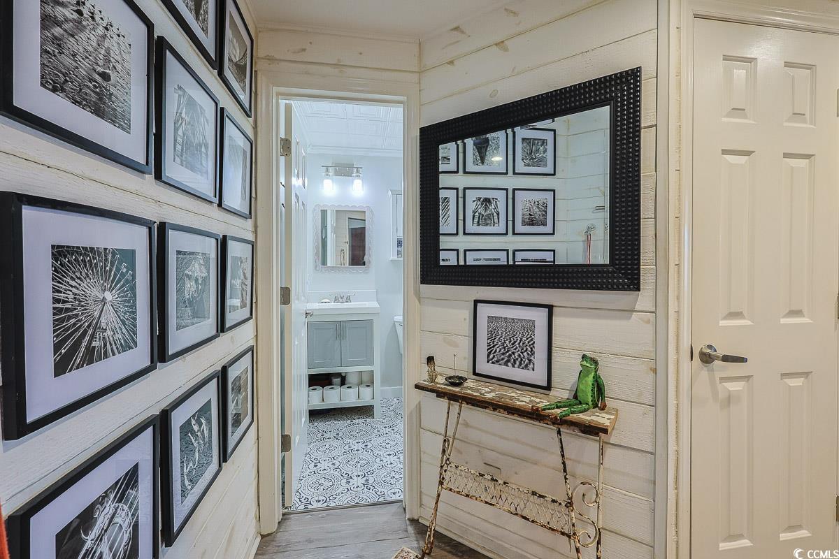 1100 Possum Trot Road, Unit G324 North Myrtle Beach, SC 29582 - Photo 19 of 28 Doorway featuring wood finished floors