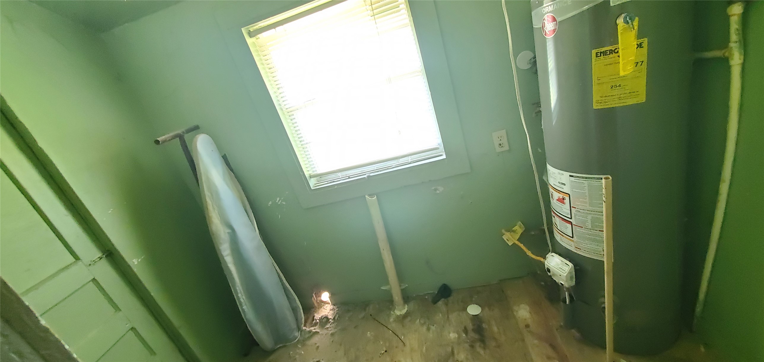 7335 Phillips Street Houston, TX 77088 - Photo 5 of 12 a bathroom with a sink a toilet and a window