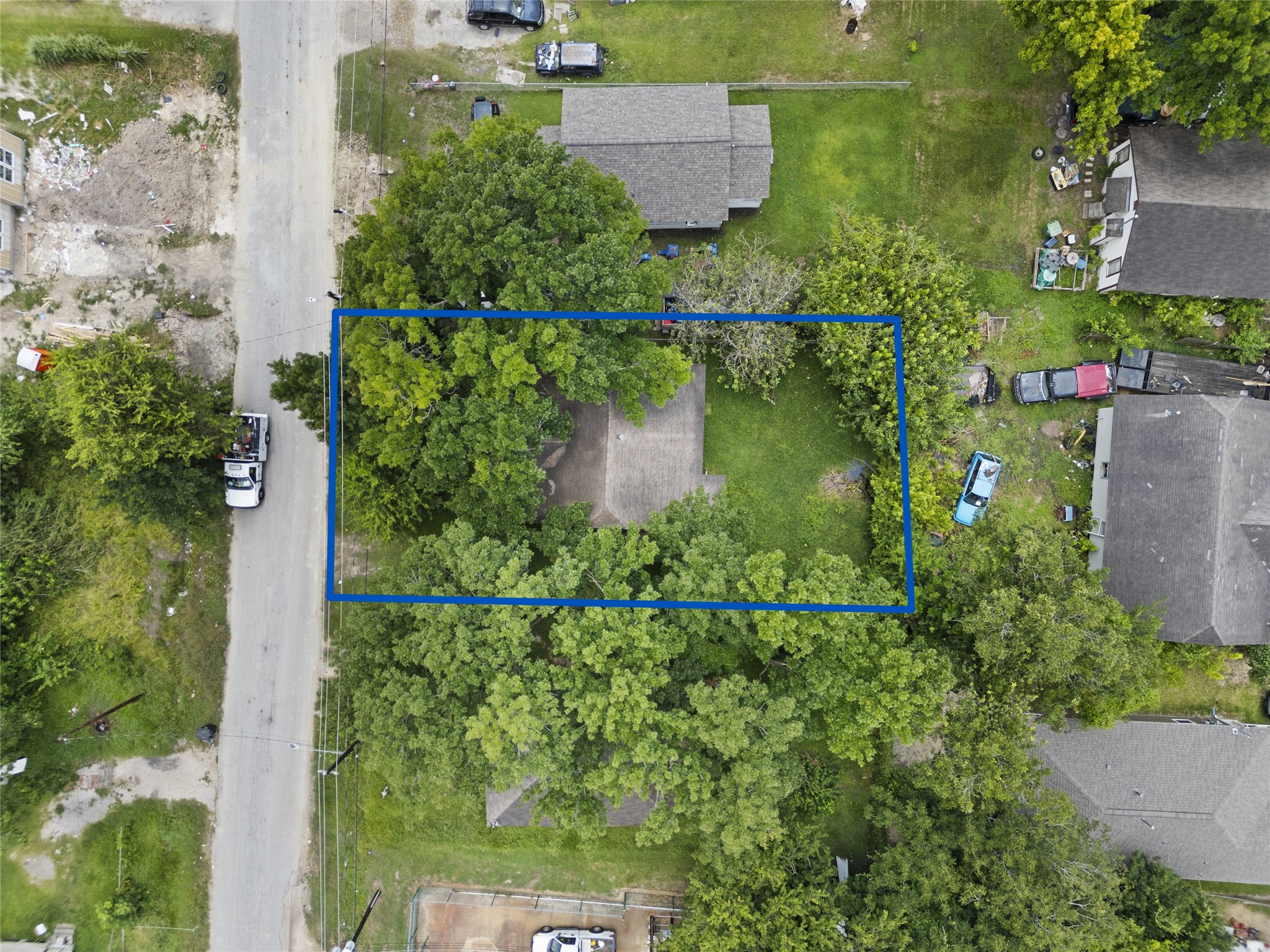 7335 Phillips Street Houston, TX 77088 - Photo 7 of 12 an aerial view of a house with a yard