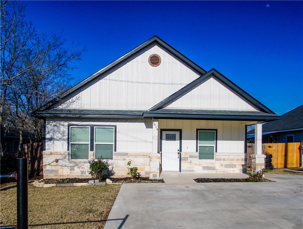 1614 Louis Street Bryan, TX 77803 - Photo 1 of 29 View of front facade featuring a porch and stone siding