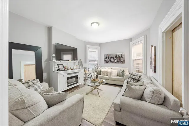 a view of room with toys and wooden floor