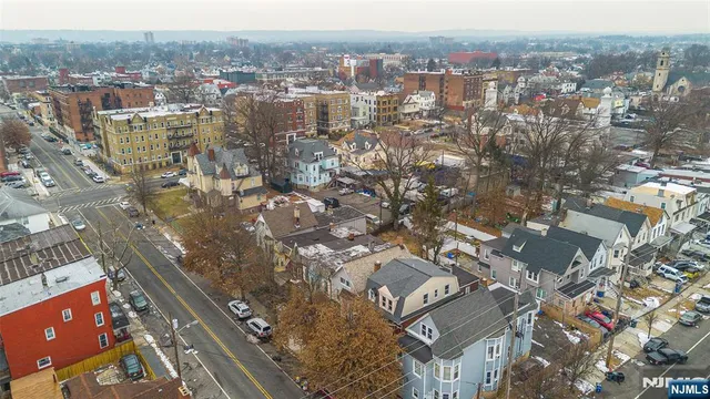 an aerial view of a city with lots of residential buildings