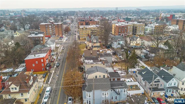 an aerial view of residential building with parking space