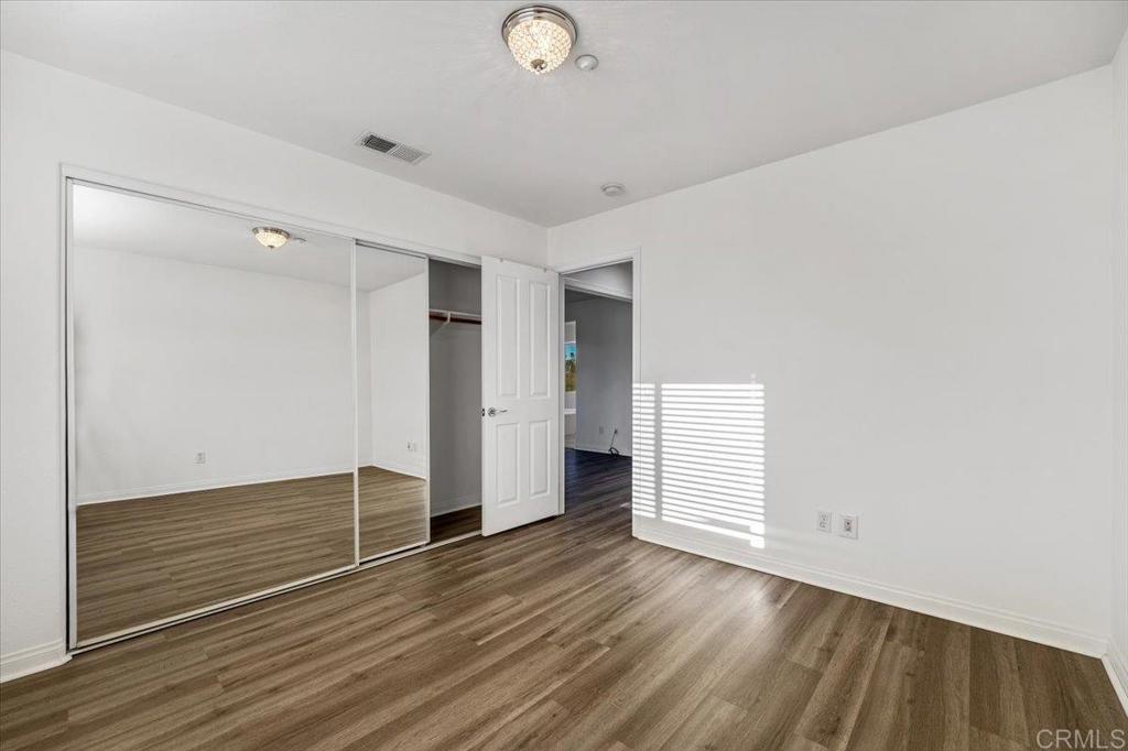 2252 Marquand Court Alpine, CA 91901 - Photo 24 of 45 a view of an empty room with wooden floor and closet