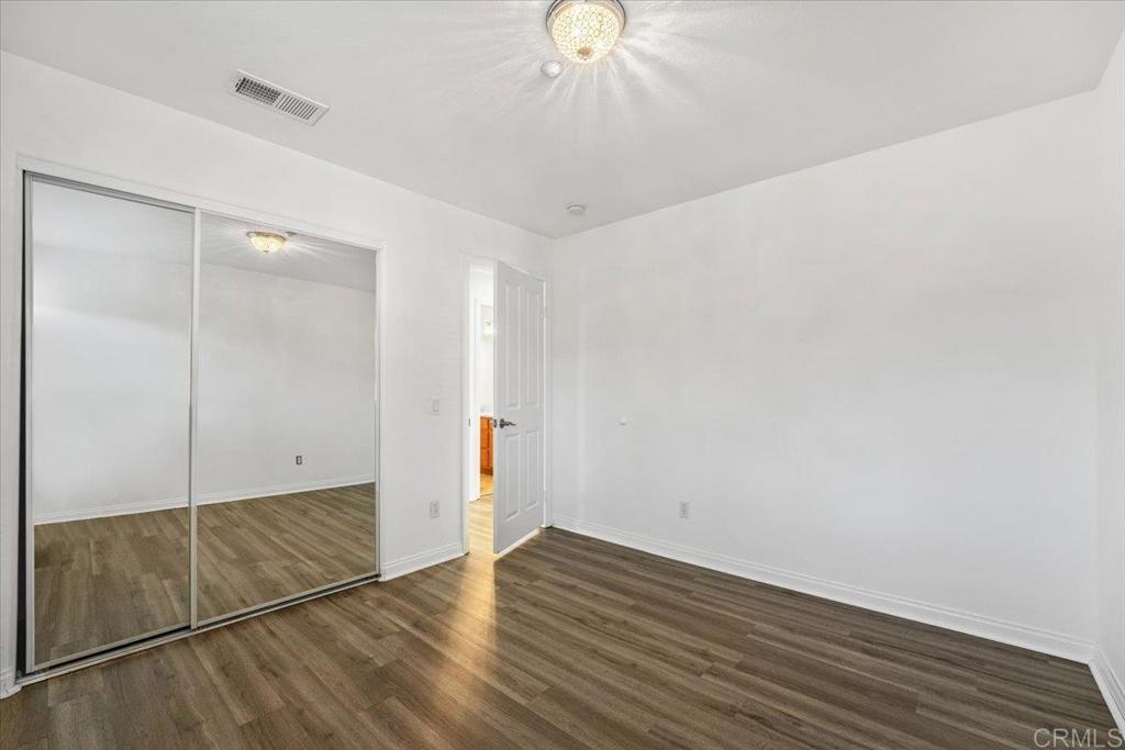 2252 Marquand Court Alpine, CA 91901 - Photo 26 of 45 a view of an empty room with wooden floor