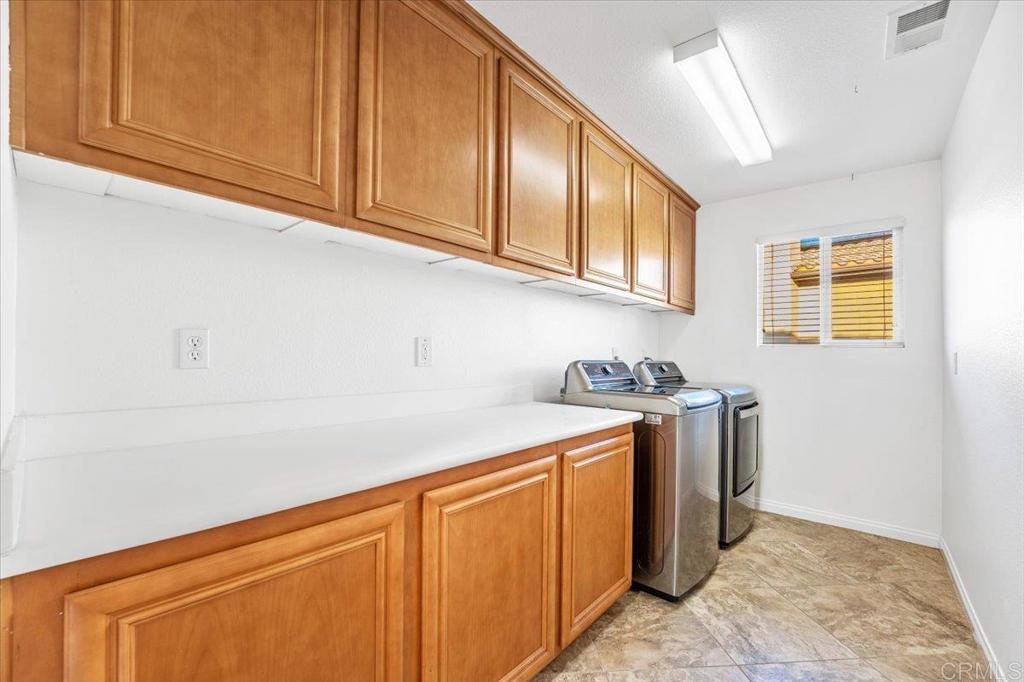 2252 Marquand Court Alpine, CA 91901 - Photo 30 of 45 a kitchen with stainless steel appliances granite countertop a sink and cabinets