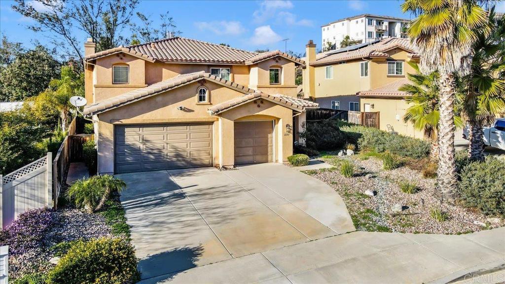 2252 Marquand Court Alpine, CA 91901 - Photo 3 of 45 a front view of a house with a yard and garage