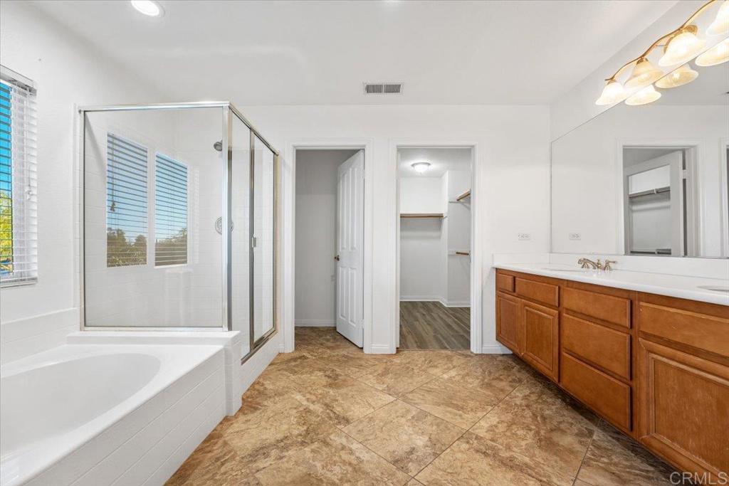 2252 Marquand Court Alpine, CA 91901 - Photo 34 of 45 a spacious bathroom with a tub sink and mirror