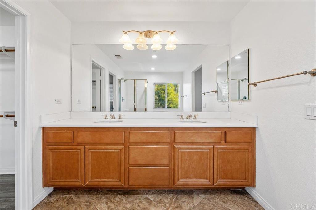 2252 Marquand Court Alpine, CA 91901 - Photo 35 of 45 a bathroom with a sink vanity and mirror