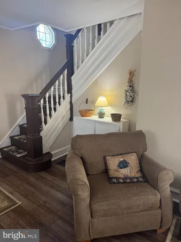a view of balcony with wooden floor