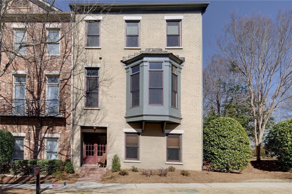 152 West Ridge Way Roswell, GA 30076 - Photo 1 of 1 a front view of a house with a yard