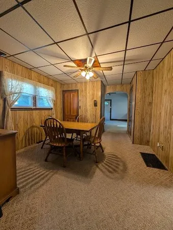 a view of a dining room with furniture