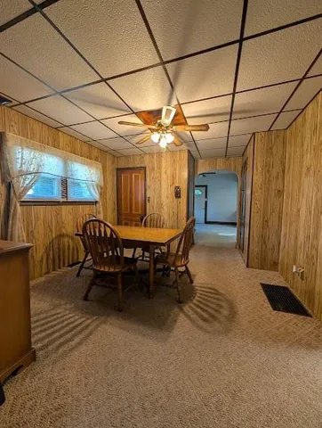 a view of a dining room with furniture