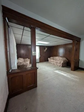 a view of a livingroom with a staircase