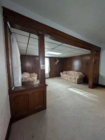 a view of a livingroom with a staircase